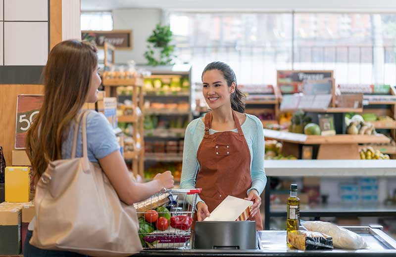 2 women at a grocery store