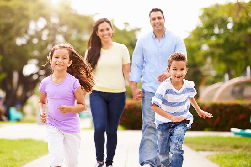 Family playing at a park